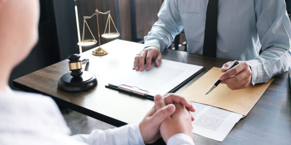 individuals going over paperwork